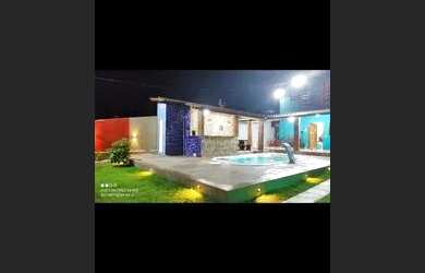 Imagem: A casa possui 5 Dormitórios, 3 Vagas na garagem e está localizado