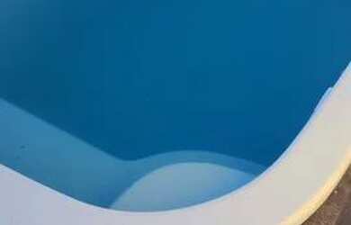 Imagem: A casa possui 2 Dormitórios, 1 Banheiro, 4 Vagas na garagem