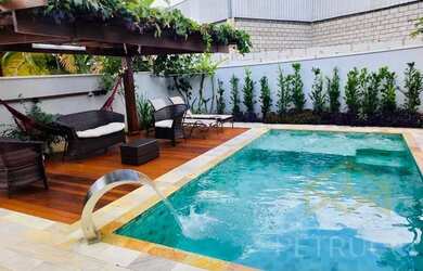 Imagem: A casa em condomínio possui 4 Dormitórios, 3 Banheiros, 4