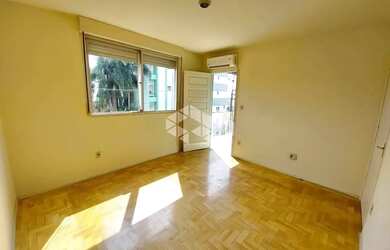 Imagem: O apartamento possui 3 Dormitórios, 1 Banheiro, 1 Vaga na garagem