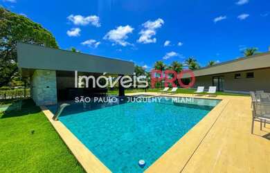 Imagem: A casa em condomínio e possui 5 Dormitórios, Suítes, 5 Banheiros