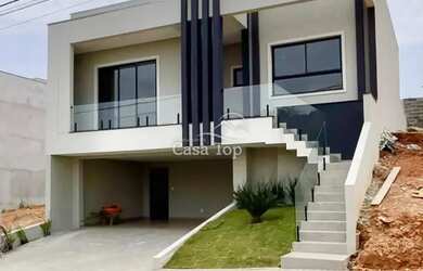 Imagem: A casa em condomínio possui 3 Dormitórios, 3 Banheiros, 2