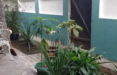 Imagem: A casa possui 2 Dormitórios, 3 Banheiros, 2 Vagas na garagem