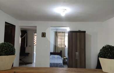 Imagem: A casa possui 5 Dormitórios, 2 Banheiros, 2 Vagas na garagem