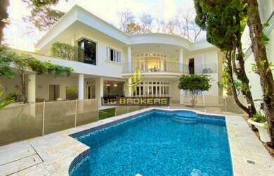 Imagem: A casa em condomínio possui 4 Dormitórios, 5 Banheiros, 2