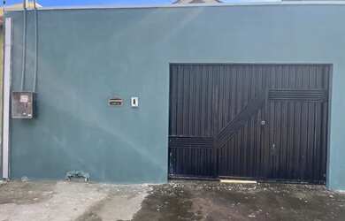 Imagem: A casa possui 2 Dormitórios, 2 Banheiros e 2 Vagas na garagem