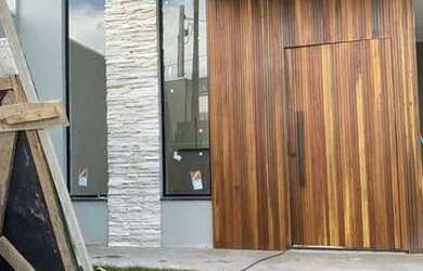 Imagem: A casa possui 3 Dormitórios, 3 Banheiros, 4 Vagas na garagem