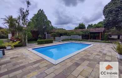 Imagem: A casa possui 5 Dormitórios, 2 Banheiros, 2 Vagas na garagem