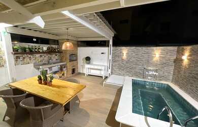 Imagem: A casa em condomínio possui 3 Dormitórios, 5 Banheiros, 2