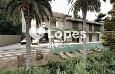 Imagem: A casa possui 5 Dormitórios, 5 Banheiros, 4 Vagas na garagem