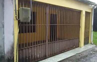 Imagem: A casa possui 2 Dormitórios, 1 Banheiro, 1 Vaga na garagem