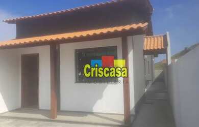 Imagem: A casa possui 3 Dormitórios, 2 Banheiros, 2 Vagas na garagem