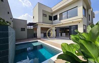 Imagem: A casa em condomínio à venda possui 3 Dormitórios, 5 Banheiros