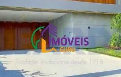 Imagem: A casa em condomínio possui 5 Dormitórios, 5 Banheiros, 4