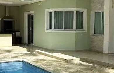 Imagem: A casa em condomínio possui 4 Dormitórios, 5 Banheiros, 5