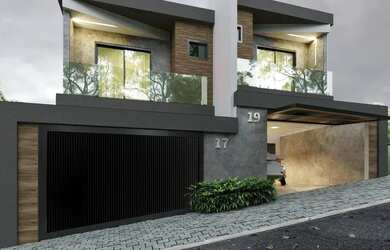 Imagem: A casa possui 3 Dormitórios, 2 Banheiros, 2 Vagas na garagem