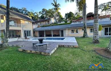 Imagem: A casa em condomínio à venda possui 5 Dormitórios, 5 Banheiros