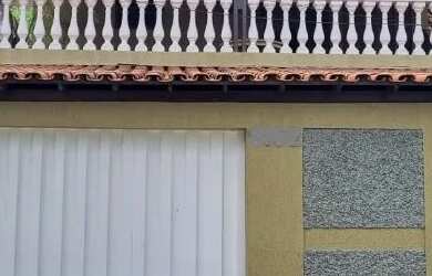 Imagem: A casa possui 3 Dormitórios, 2 Banheiros, 2 Vagas na garagem