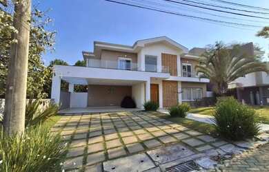 Imagem: A casa em condomínio possui 4 Dormitórios, 4 Banheiros, 5