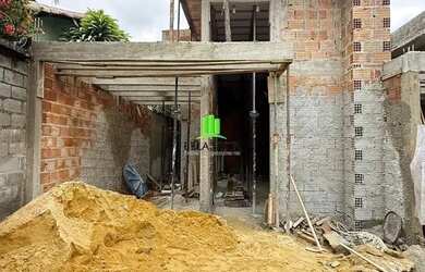 Imagem: A casa possui 3 Dormitórios, 2 Banheiros, 2 Vagas na garagem