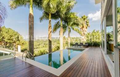 Imagem: A casa em condomínio possui 4 Dormitórios, 5 Banheiros, 5