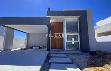 Imagem: A casa possui 3 Dormitórios, 2 Banheiros, 2 Vagas na garagem