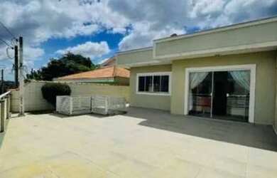 Imagem: A casa possui 3 Dormitórios, 3 Banheiros, 3 Vagas na garagem