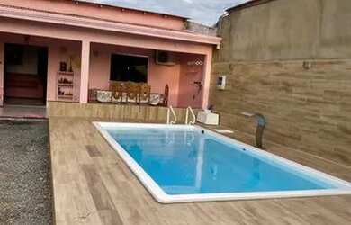 Imagem: A casa possui 2 Dormitórios, 2 Banheiros e está localizado