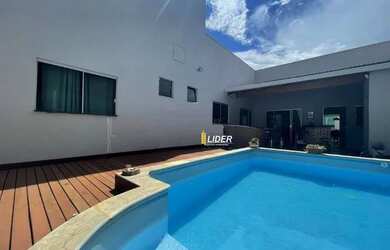 Imagem: A casa possui 3 Dormitórios, 5 Banheiros, 3 Vagas na garagem