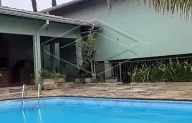 Imagem: A casa possui 5 Dormitórios, 4 Banheiros, 5 Vagas na garagem