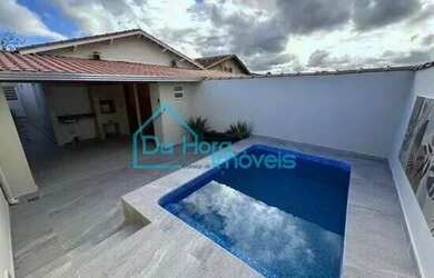 Imagem: A casa possui 2 Dormitórios, 3 Banheiros, 3 Vagas na garagem