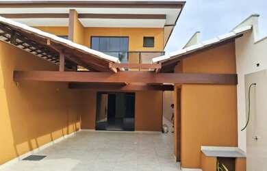 Imagem: A casa possui 4 Dormitórios, 5 Banheiros, 3 Vagas na garagem