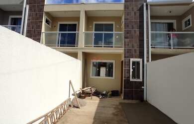 Imagem: A casa possui 3 Dormitórios, 1 Banheiro, 1 Vaga na garagem