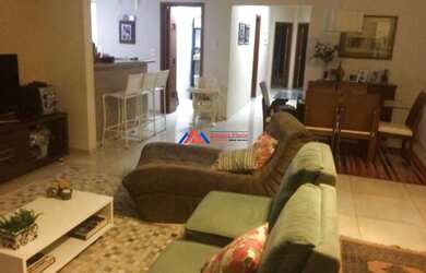 Imagem: A casa possui 3 Dormitórios, 4 Banheiros, 5 Vagas na garagem