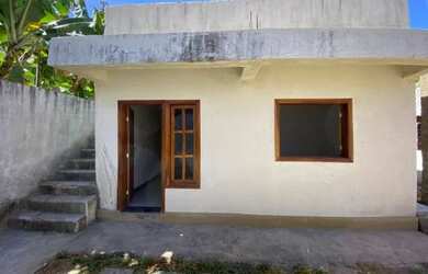 Imagem: A casa possui 2 Dormitórios, 1 Banheiro, 1 Vaga na garagem