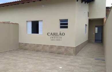 Imagem: A casa possui 2 Dormitórios, 2 Banheiros, 2 Vagas na garagem