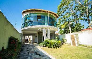 Imagem: A casa possui 4 Dormitórios, 4 Banheiros, 3 Vagas na garagem