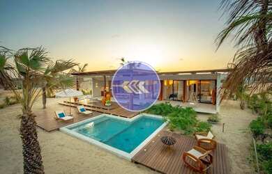 Imagem: A casa possui 3 Dormitórios, 5 Banheiros, 3 Vagas na garagem