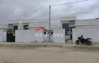 Imagem: A casa possui 3 Dormitórios, 2 Banheiros, 1 Vaga na garagem