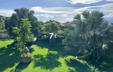 Imagem: A casa possui 4 Dormitórios, 5 Banheiros, 4 Vagas na garagem