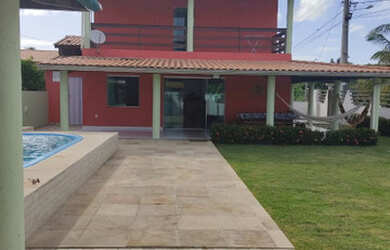 Imagem: A casa possui 3 Dormitórios, 4 Vagas na garagem e está localizado