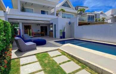 Imagem: A casa possui 4 Dormitórios, 5 Banheiros, 3 Vagas na garagem