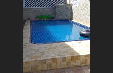 Imagem: A casa possui 4 Dormitórios, 4 Banheiros, 2 Vagas na garagem