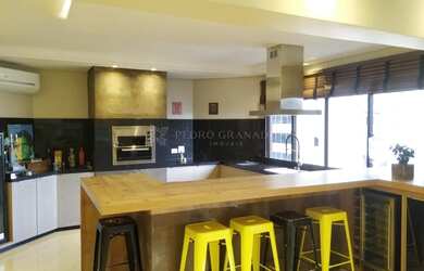 Imagem: O apartamento possui 3 Dormitórios, 5 Banheiros, 2 Vagas na