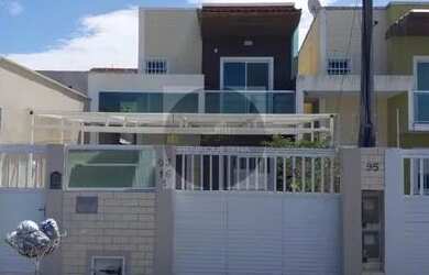 Imagem: A casa possui 4 Dormitórios, 2 Banheiros, 3 Vagas na garagem