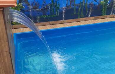 Imagem: A casa possui 1 Dormitório, 4 Vagas na garagem e está localizado