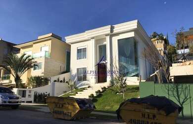 Imagem: A casa em condomínio possui 4 Dormitórios, 5 Banheiros, 5