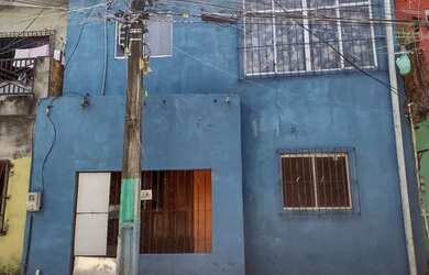 Imagem: A casa possui 3 Dormitórios, 1 Banheiro e está localizado