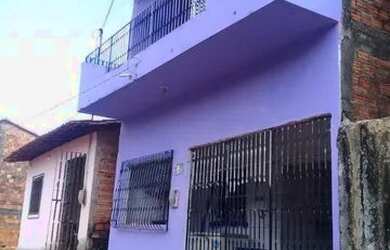 Imagem: A casa possui 4 Dormitórios, 2 Banheiros, 1 Vaga na garagem