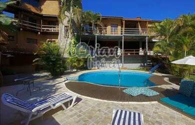 Imagem: A casa em condomínio possui 4 Dormitórios, 5 Banheiros, 5